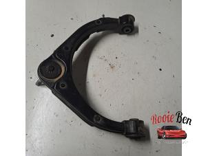 Gebrauchte Querlenker oben links vorne Dodge 1500 Crew Cab (DS) 5.7 Hemi V8 4x4 Preis auf Anfrage angeboten von Rooie Ben autodemontage