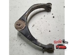 Gebrauchte Querlenker oben links vorne Dodge 1500 Crew Cab (DS) 5.7 Hemi V8 4x4 Preis auf Anfrage angeboten von Rooie Ben autodemontage