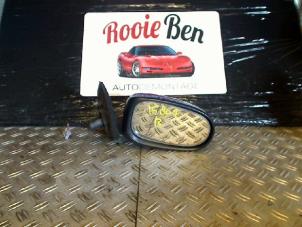 Used Wing mirror, right Nissan Almera (N16) 1.5 16V Price € 25,00 Margin scheme offered by Rooie Ben autodemontage