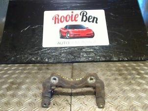 Used Front brake calliperholder, left Jeep Grand Cherokee (WG/WJ) 4.7i V-8 HO Price on request offered by Rooie Ben autodemontage