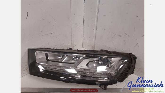 Używane Reflektor lewy Audi Q7 Cena € 747,00 Procedura marży oferowane przez Klein Gunnewiek Autodemontage & Motorentechniek