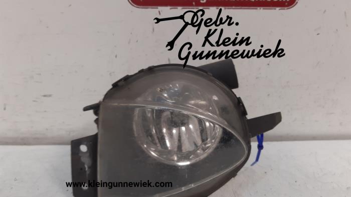 Fog light, front left from a BMW 3-Serie 2007