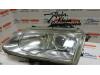 Headlight, left from a Renault Espace 2001