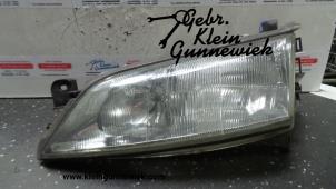 Używane Reflektor lewy Opel Vectra Cena € 35,00 Procedura marży oferowane przez Gebr.Klein Gunnewiek Ho.BV