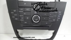 Gebrauchte Radiobedienfeld Opel Insignia Preis € 90,00 Margenregelung angeboten von Gebr.Klein Gunnewiek Ho.BV