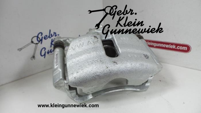 Front brake calliper, left from a Volkswagen Golf 2019
