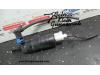Headlight washer pump from a Opel Astra 2010