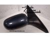 Wing mirror, right from a Opel Tigra 2006