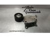 Drive belt tensioner from a Ford Mondeo 2011