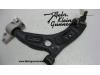 Front lower wishbone, left from a Seat Leon 2011
