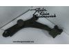 Front lower wishbone, left from a Mazda 3. 2004