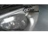 Headlight, left from a BMW 1-Serie 2006
