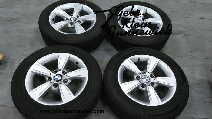Set of wheels + tyres from a BMW 1-Serie 2008