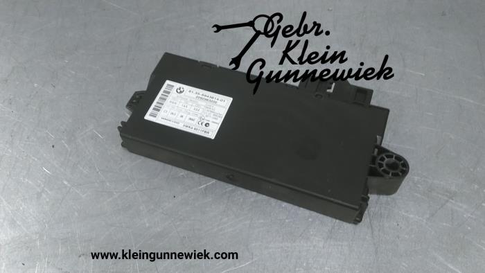 Central door locking module from a BMW 3-Serie 2007