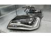 Headlight, left from a Audi A8 2011