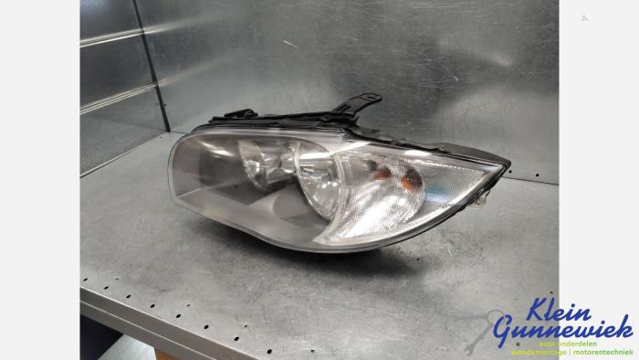 Używane Reflektor lewy BMW 1-Serie Cena € 75,00 Procedura marży oferowane przez Klein Gunnewiek Autodemontage & Motorentechniek