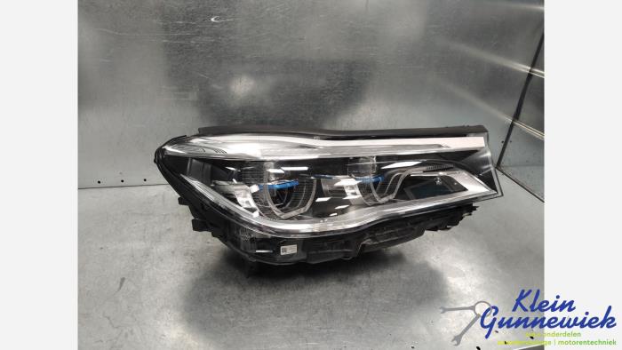 Używane Reflektor prawy BMW 7-Serie Cena € 1.524,00 Procedura marży oferowane przez Klein Gunnewiek Autodemontage & Motorentechniek