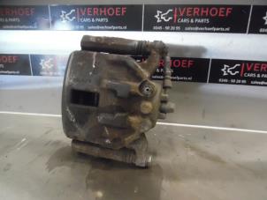 Used Front brake calliper, right Honda Civic (FK/FN) 1.4i Type S 16V Price on request offered by Verhoef Cars & Parts