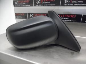 Used Wing mirror, right Mazda Demio (DW) 1.3 16V Price € 40,00 Margin scheme offered by Verhoef Cars & Parts