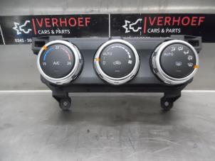 Używane Panel sterowania nagrzewnicy Mazda CX-3 2.0 SkyActiv-G 120 Cena € 90,00 Procedura marży oferowane przez Verhoef Cars & Parts