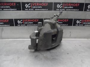 Used Front brake calliper, left Volvo V50 (MW) 2.4 20V Price on request offered by Verhoef Cars & Parts