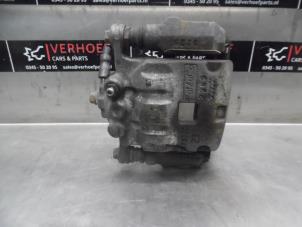 Used Front brake calliper, left Ford Fiesta 6 (JA8) 1.25 16V Price on request offered by Verhoef Cars & Parts