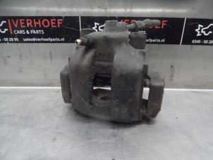 Used Rear brake calliper, left BMW 3 serie (E46/4) 320d 16V Price on request offered by Verhoef Cars & Parts