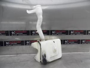 Used Front windscreen washer reservoir Mazda Demio (DW) 1.5 16V Price on request offered by Verhoef Cars & Parts