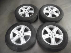 Used Set of sports wheels Suzuki Grand Vitara II (JT) 1.9 DDiS Price on request offered by Verhoef Cars & Parts
