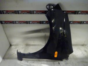Used Front wing, left Daihatsu Cuore (L251/271/276) 1.0 12V DVVT Price € 40,00 Margin scheme offered by Verhoef Cars & Parts