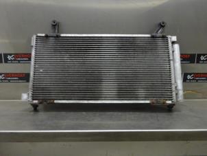Usados Radiador de aire acondicionado Suzuki Liana (ERA/ERB/RH4) 1.6 MPi 16V Precio de solicitud ofrecido por Verhoef Cars & Parts