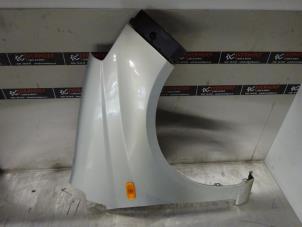 Used Front wing, right Daihatsu Cuore (L251/271/276) 1.0 12V DVVT Price € 70,00 Margin scheme offered by Verhoef Cars & Parts