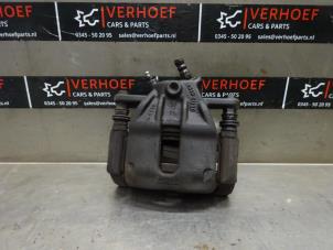Used Front brake calliper, right Renault Clio III (BR/CR) 1.2 16V 75 Price on request offered by Verhoef Cars & Parts