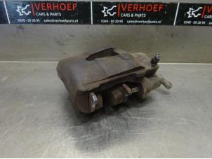 Used Front brake calliper, left Volkswagen Caddy III (2KA,2KH,2CA,2CH) 1.6 TDI 16V Price on request offered by Verhoef Cars & Parts