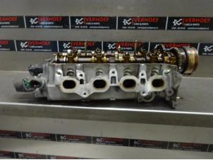 Used Cylinder head Daihatsu YRV (M2) 1.3 16V DVVT Turbo Price on request offered by Verhoef Cars & Parts