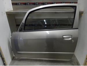 Used Door 2-door, left Mitsubishi Colt (Z2/Z3) 1.3 16V Price € 100,00 Margin scheme offered by Verhoef Cars & Parts