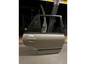 Used Rear door 4-door, right Mazda 323 Fastbreak (BJ14) 2.0 DTiD 16V Price on request offered by Verhoef Cars & Parts