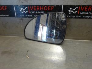 Used Mirror glass, left Kia Cee'd Sporty Wagon (EDF) 1.6 16V Price on request offered by Verhoef Cars & Parts