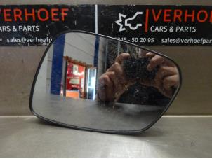 Used Mirror glass, left Opel Karl 1.0 12V Price on request offered by Verhoef Cars & Parts