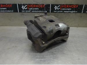 Used Front brake calliper, left Ford Fiesta 6 (JA8) 1.6 TDCi 16V ECOnetic Price on request offered by Verhoef Cars & Parts