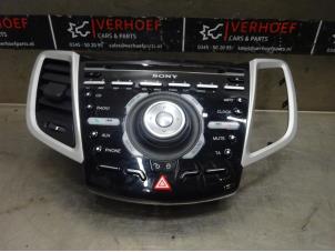 Gebrauchte Radiobedienfeld Ford Fiesta 6 (JA8) 1.6 TDCi 16V ECOnetic Preis € 50,00 Margenregelung angeboten von Verhoef Cars & Parts