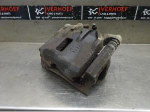 Used Front brake calliper, left Honda Civic (FK/FN) 1.8i VTEC 16V Price on request offered by Verhoef Cars & Parts