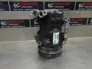 Used Air conditioning pump Renault Clio III (BR/CR) 1.2 16V TCe 100 Price on request offered by Verhoef Cars & Parts