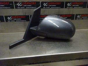 Used Wing mirror, left Mitsubishi Colt (Z2/Z3) 1.3 16V Price on request offered by Verhoef Cars & Parts