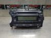 Radio CD player from a Toyota Yaris III (P13), 2010 / 2020 1.0 12V VVT-i, Hatchback, Petrol, 998cc, 51kW (69pk), FWD, 1KRFE, 2010-12 / 2020-06, KSP13 2014