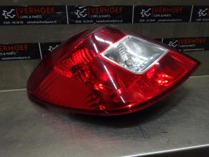 Used Taillight, left Opel Corsa D 1.4 16V Twinport Price € 25,00 Margin scheme offered by Verhoef Cars & Parts