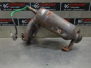 Used Catalytic converter Daihatsu Cuore (L251/271/276) 1.0 12V DVVT Price on request offered by Verhoef Cars & Parts
