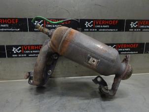 Used Catalytic converter Daihatsu Cuore (L251/271/276) 1.0 12V DVVT Price on request offered by Verhoef Cars & Parts