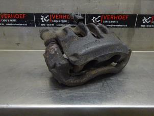 Used Front brake calliper, left Nissan NV 400 (M9J) 2.3 dCi 100 16V Price on request offered by Verhoef Cars & Parts