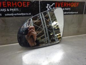 Used Mirror glass, left Toyota Aygo (B40) 1.0 12V VVT-i Price € 15,00 Margin scheme offered by Verhoef Cars & Parts
